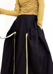 Französische schwarze hohe Taille, faltige Taschen, asymmetrisches Design, Herbströcke