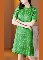 Handgemachtes grünes Seidenkleid mit O-Ausschnitt und Druckknopf und kurzen Ärmeln