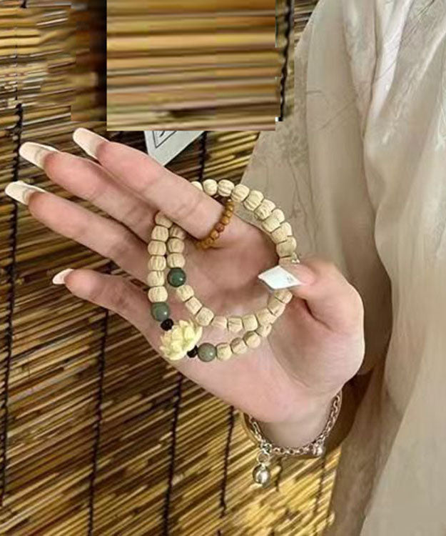 Handmade Light Yellow Lotus Buddha Beads Charm Bracelet