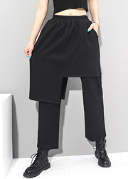 Italienischer schwarzer asymmetrischer Taschen-elastische Taillen-Baumwollhosen-Rock-Herbst