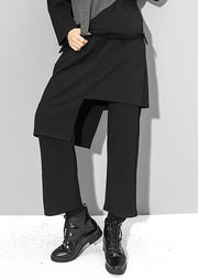 Italienischer schwarzer asymmetrischer Taschen-elastische Taillen-Baumwollhosen-Rock-Herbst