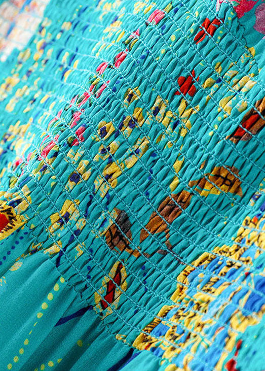 Italienisch Blau V-Ausschnitt Rüschendruck Elastische Taille Seide Strandkleider Umhang Ärmel