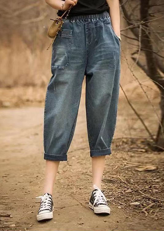 Italienische Denim-Blaue elastische Taille asymmetrische Taschen Baumwoll-Crop-Hosen Sommer