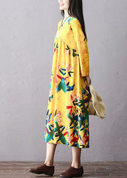 Langes Kleid aus italienischer gelber, faltiger, bestickter Baumwolle mit langen Ärmeln