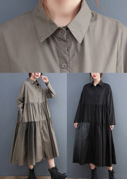 Lockeres schwarzes Hemdkleid mit Bubikragen aus Baumwolle mit langen Ärmeln