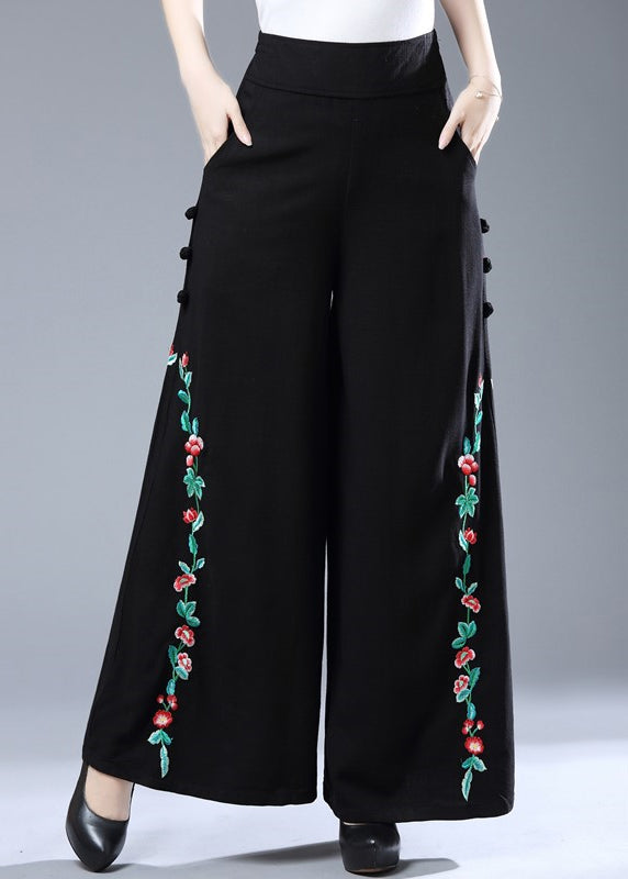 Moderne, schwarze, bestickte, florale, elastische Taillenhose mit weitem Bein im Herbst