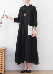 Modernes schwarzes Stehkragen-Falten-Patchwork-Hemdkleid mit langen Ärmeln