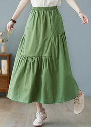Moderner grüner, faltiger, asymmetrischer Taschen-Herbstrock mit hoher Taille