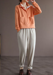 Moderne orangefarbene Stehkragentaschen Reißverschluss-Pullover mit langen Ärmeln