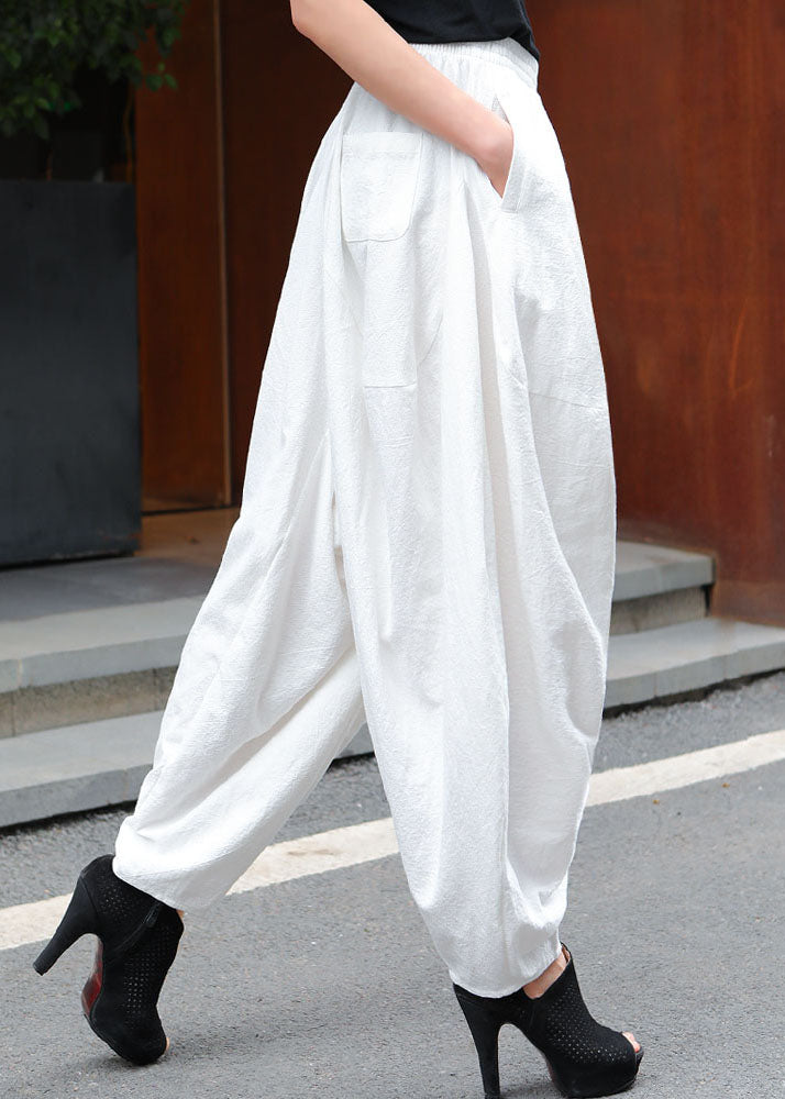 Moderne, weiße, elastische Taillentaschen, asymmetrisches Design, Frühlingshose
