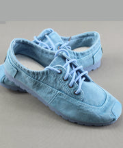 Flache Schuhe aus blauem Baumwollgewebe für Damen mit Kreuzriemen