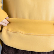 Einfache Tunika-Oberteile aus Baumwolle, hochwertiger Stehkragen. Nähen Sie ein gelbes, lockeres Oberteil