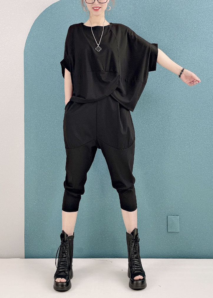 Stil: Schwarze, asymmetrische Baumwoll-Tops mit O-Ausschnitt und Haremshosen, zweiteiliges Set mit kurzen Ärmeln