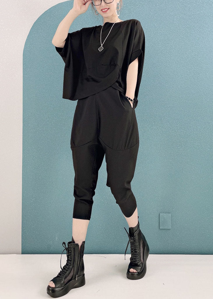 Stil: Schwarze, asymmetrische Baumwoll-Tops mit O-Ausschnitt und Haremshosen, zweiteiliges Set mit kurzen Ärmeln