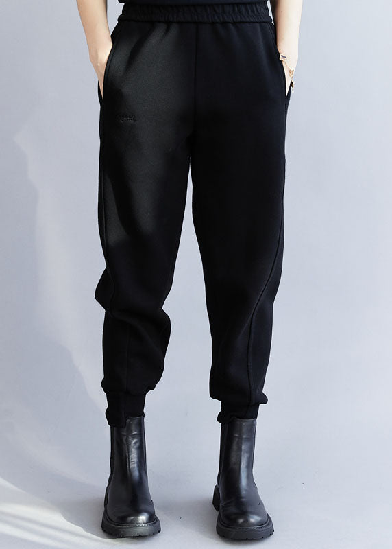 Stilvolle schwarze elastische Taillen-Fisch-bestickte warme Fleece-Balkenhose Winter