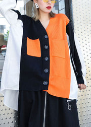 Stilvolles schwarzes Patchwork mit orangefarbenen Taschen, asymmetrisches Design, Herbst-Strickoberteil