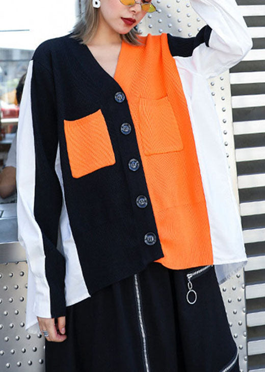 Stilvolles schwarzes Patchwork mit orangefarbenen Taschen, asymmetrisches Design, Herbst-Strickoberteil