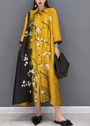Vogue Gelbes Seidenkleid mit langen Ärmeln und Knopfdruck und Knopfdruck