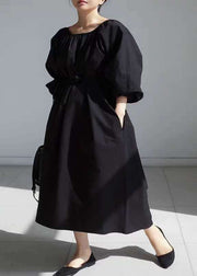 Einfaches schwarzes Damenkleid mit Puffärmeln aus Baumwolle mit schwarzer Taille