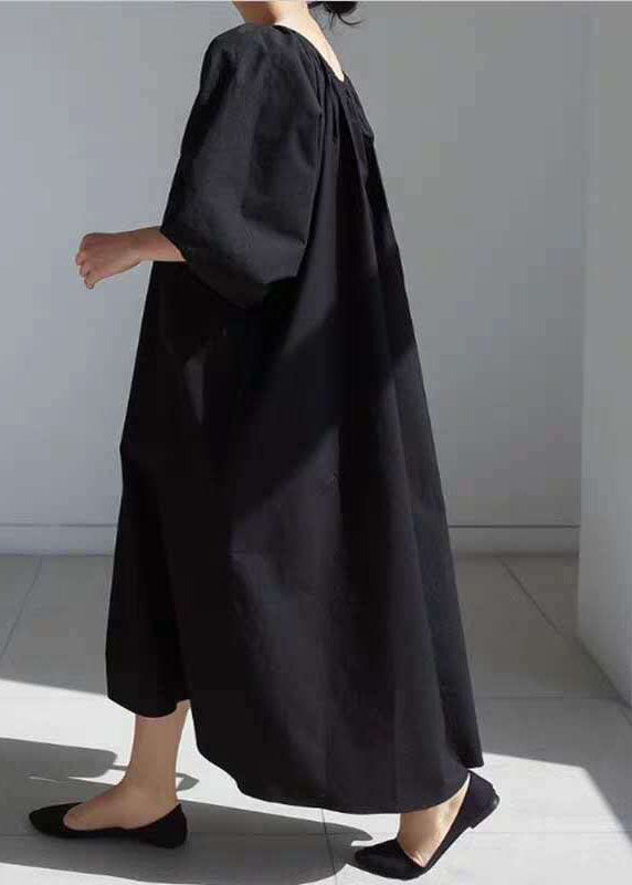 Einfaches schwarzes Damenkleid mit Puffärmeln aus Baumwolle mit schwarzer Taille