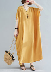 Gelbes, originelles Design-Baumwoll-Urlaubskleid mit V-Ausschnitt und kurzen Ärmeln