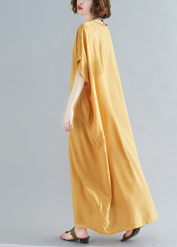 Gelbes, originelles Design-Baumwoll-Urlaubskleid mit V-Ausschnitt und kurzen Ärmeln