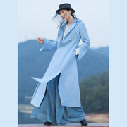 Boutique Hellblauer Wollmantel Damen Locker sitzender langer Mantel mit offenen Langarmstickereien