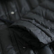 neue schwarze Outfits plus Größe Daunenjacke mit Kapuze und Kordelzug Eleganter Daunenmantel mit Taschen