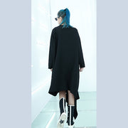 feines schwarzes Kleid in Midi-Länge, übergroß, reisendes, asymmetrisches Design, Boutique-Herbstkleid mit O-Ausschnitt