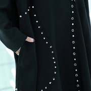 feines schwarzes Kleid in Midi-Länge, übergroß, reisendes, asymmetrisches Design, Boutique-Herbstkleid mit O-Ausschnitt