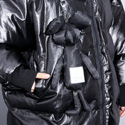 feine schwarze Daunenjacke plus Größe Baumwollmantel mit Kapuze Elegante Reißverschlusstaschen über dem Mantel